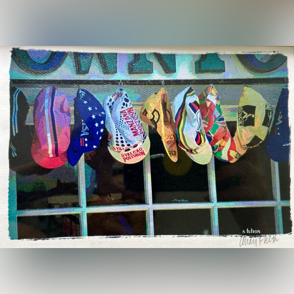 Sign Print Bicycle Racing Hats Hanging Outside Cafe